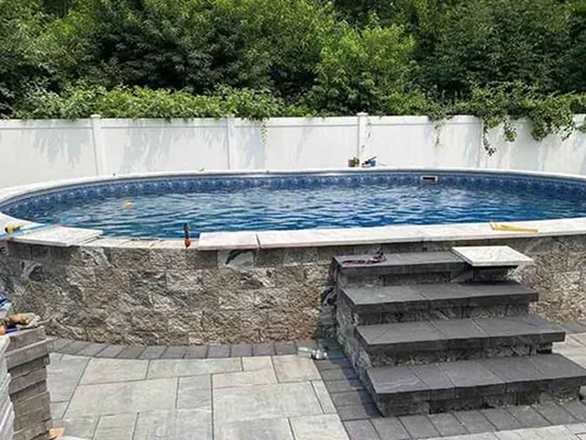 Stone veneer pool wall central islip new york